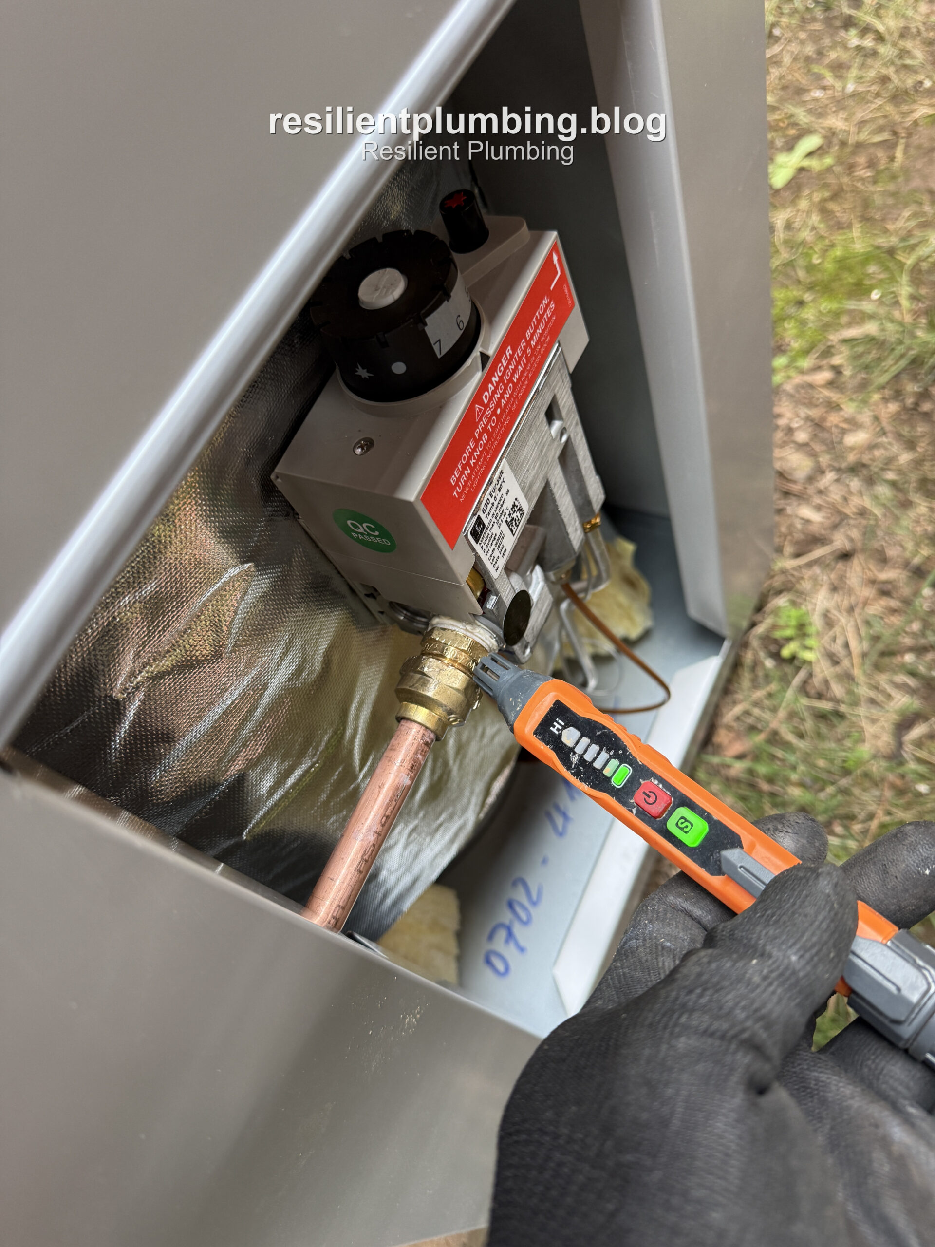 Testing the gas control valve on a newly installed hot water unit